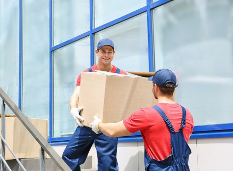 Piano moving equipment and protective wrapping used during a Tooting removal