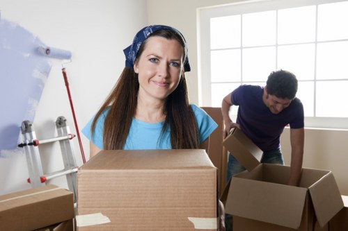 Professional moving team handling belongings before transport