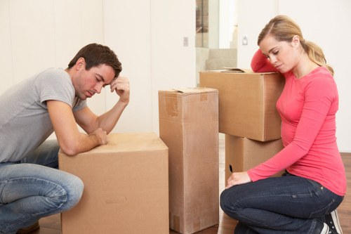 Moving staff wearing PPE during a house removal