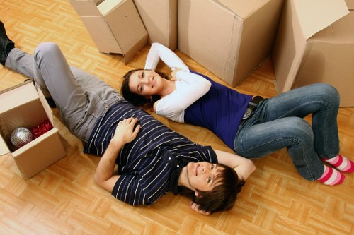 Professional movers securing a piano for safe relocation in South London